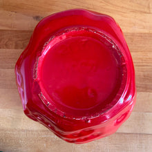 Load image into Gallery viewer, Rare vintage retro figural red strawberry cookie jar, topped with green lid. Crafted by McCoy Pottery, USA, 1970s. A good sized stoneware canister for a large batch of cookies that will look great as part of your kitchen decor!

In vintage condition, no chips/cracks/repairs, scuffing at the rim of the strawberry. Maker's mark on bottom.

Measures 7 1/4 x 9 3/4 inches
