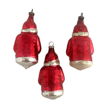 Load image into Gallery viewer, Stunning vintage red and silver mercury glass figural Santa Claus holding a green Christmas tree decorated with white sugar texture, Christmas tree ornament. Made in Germany. Perfect for the tree or dress up your holiday decor.

In vintage condition. Marks are indecipherable.

Measures 3 1/2 inches
