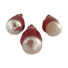 Load image into Gallery viewer, Stunning vintage red and silver mercury glass figural Santa Claus holding a green Christmas tree decorated with white sugar texture, Christmas tree ornament. Made in Germany. Perfect for the tree or dress up your holiday decor.

In vintage condition. Marks are indecipherable.

Measures 3 1/2 inches
