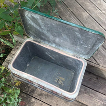 Load image into Gallery viewer, Complete your al fresco dining experience with this fantastic red, white and green plaid metal picnic cooler. There is a handle for ease of carrying and a drain for excess water. Marked on the bottom, GSW Proudly Canadian. Add this awesome nostalgic conversation starter to your family gatherings, romantic adventures or home decor!  In used vintage condition. Please see photos.  Measures 18 x 11 x 13 1/4 inches   
