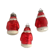 Load image into Gallery viewer, Stunning vintage red and silver figural mercury glass Santa Claus holding a green tree, Christmas tree ornament. Made in Germany. Dress up your holiday tree or display with these beautiful hand crafted ornaments.

In vintage condition. One marked East Germany, one marked Made in GDR, one unmarked.

Measures 3 1/2 inches
