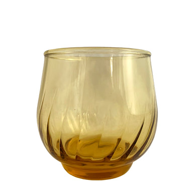 Vintage Regal Gold or honey coloured 9oz glass tumbler featuring an swirl optic pattern. Crafted by Anchor Hocking, USA, circa 1970s. In excellent used vintage condition, free from chips. Measures 3 x 3 1/8 inches