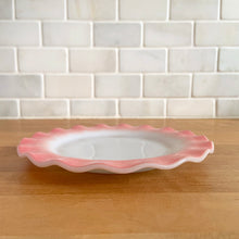 Load image into Gallery viewer, Sweet vintage mid-century era Ripple Pink aka Pink Crinoline milk glass tableware. Crafted by Hazel-Atlas Glass, USA, 1950s. The lovely tableware has a pretty ruffled pink edge on white milk glass and the cups and creamer have a beaded handle. A beautiful way to set a table! 7&quot; Salad Plate measures 6 7/8 inches. In as found vintage condition, no chips, with age-related wear.
