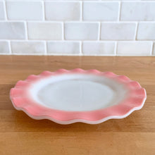 Load image into Gallery viewer, Sweet vintage mid-century era Ripple Pink aka Pink Crinoline milk glass tableware. Crafted by Hazel-Atlas Glass, USA, 1950s. The lovely tableware has a pretty ruffled pink edge on white milk glass and the cups and creamer have a beaded handle. A beautiful way to set a table! 7&quot; Salad Plate measures 6 7/8 inches. In as found vintage condition, no chips, with age-related wear.
