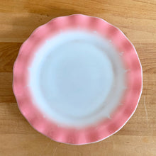 Load image into Gallery viewer, Sweet vintage mid-century era Ripple Pink aka Pink Crinoline milk glass tableware. Crafted by Hazel-Atlas Glass, USA, 1950s. The lovely tableware has a pretty ruffled pink edge on white milk glass and the cups and creamer have a beaded handle. A beautiful way to set a table! 7&quot; Salad Plate measures 6 7/8 inches. In as found vintage condition, no chips, with age-related wear.
