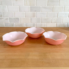 Load image into Gallery viewer, Sweet vintage mid-century era Ripple Pink aka Pink Crinoline milk glass tableware. Crafted by Hazel-Atlas Glass, USA, 1950s. The lovely tableware has a pretty ruffled pink edge on white milk glass and the cups and creamer have a beaded handle. A beautiful way to set a table! Cereal bowl. In as found vintage condition, no chips, with age-related wear.

