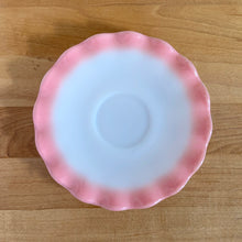Load image into Gallery viewer, Sweet vintage mid-century era Ripple Pink aka Pink Crinoline milk glass tableware. Crafted by Hazel-Atlas Glass, USA, 1950s. The lovely tableware has a pretty ruffled pink edge on white milk glass and the cups and creamer have a beaded handle. A beautiful way to set a table! Saucer. In as found vintage condition, no chips, with age-related wear.

