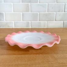Load image into Gallery viewer, Sweet vintage mid-century era Ripple Pink aka Pink Crinoline milk glass tableware. Crafted by Hazel-Atlas Glass, USA, 1950s. The lovely tableware has a pretty ruffled pink edge on white milk glass and the cups and creamer have a beaded handle. A beautiful way to set a table! Saucer. In as found vintage condition, no chips, with age-related wear.
