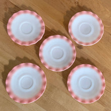 Load image into Gallery viewer, Sweet vintage mid-century era Ripple Pink aka Pink Crinoline milk glass tableware. Crafted by Hazel-Atlas Glass, USA, 1950s. The lovely tableware has a pretty ruffled pink edge on white milk glass and the cups and creamer have a beaded handle. A beautiful way to set a table! Saucer. In as found vintage condition, no chips, with age-related wear.
