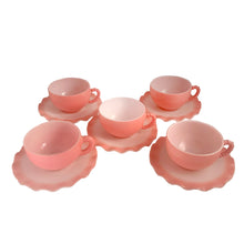 Load image into Gallery viewer, Sweet vintage mid-century era Ripple Pink aka Pink Crinoline milk glass tableware. Crafted by Hazel-Atlas Glass, USA, 1950s. The lovely tableware has a pretty ruffled pink edge on white milk glass and the cups and creamer have a beaded handle. A beautiful way to set a table! Cup and Saucer. In as found vintage condition, no chips, with age-related wear.
