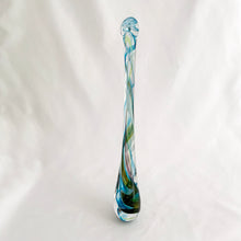 Load image into Gallery viewer, Catch some rays with this artfully hand blown art glass &quot;Rooted In Love&quot; clear raindrop  suncatcher swirled in shades of blue, purple and green. Produced by Alyssa Getz and Tom Cudmore of Tropical Iceberg Glass in Mississauga, Canada. Made with a looped top for ease of hanging.  In like new condition with original tags, free from chips/cracks.  Measures 1 3/8 x 10 3/8 inches
