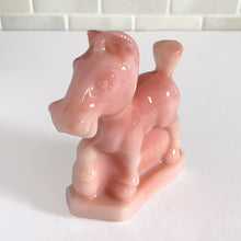 Load image into Gallery viewer, Vintage rosaline slag glass Oscar plug horse figurine. Originally designed and produced by Heisey Glass 1941 - 1946. Reproduction crafted with original mold by Fenton Art Glass, 1990. Marked with HCA 90 and Fenton logo. Only 1267 of the rosaline plug horses were made, making it highly collectible. This playful horse is perfect to start or add to your collection or to gift to the animal lover in your life! New old stock, in excellent condition, free from chips. Measures approximately 4 x 1 1/2 x 4 inches
