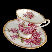 Load image into Gallery viewer, Complete view of 1950s Roslyn China Sunningdale teacup and saucer set, teacup 3⅜ inches diameter, saucer 5¾ inches diameter

