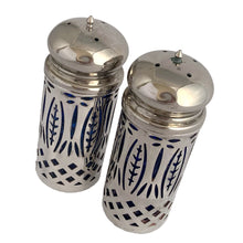 Load image into Gallery viewer, Vintage Avon &quot;Royal Sapphire Collection&quot; cobalt blue glass salt and pepper shakers with silver plated filigree sleeves.  In excellent condition, no chips to the glass. Wear to the lids, see photos.  Measures 1 1/2 x 4 inches
