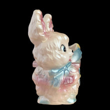 Load image into Gallery viewer, Opposite side view of vintage Rubens Originals bunny planter displaying pink, blue, yellow and white lustreware glaze finish
