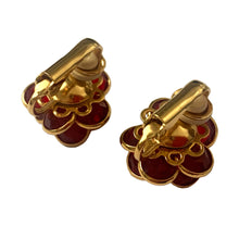 Load image into Gallery viewer, Back view of vintage Swarovski ruby red crystal flower earrings showing gold-tone clip-on mechanisms and construction
