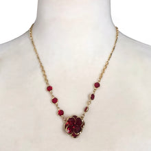 Load image into Gallery viewer, Vintage Swarovski ruby red crystal flower necklace displayed on mannequin showing how it sits at neckline, 19.5 inches long
