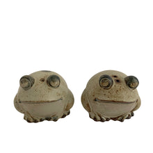 Load image into Gallery viewer, Vintage figural frog stoneware salt and pepper shakers. Crafted in Japan, Giftcraft import, 1970s. Perfect fo the frog collector!

In excellent condition, no chips, cracks or repairs. Original stoppers.

Each shaker measures 2 1/2 x 2 1/4 x 2 inches
