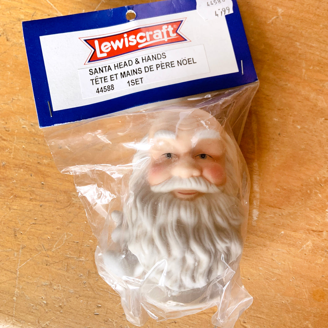 Attention doll makers and crafters! New old stock, vintage porcelain Santa Claus doll head and hands. Made for Lewiscraft in China, circa 1990s. Part number 44588. Whip up a sweet Santa to feature in your Christmas decor!