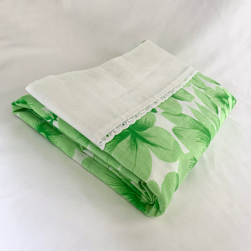 Dress your bed in these retro green and white floral 
