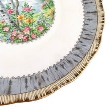 Load image into Gallery viewer, A selection of hand painted vintage &quot;Silver Birch&quot; porcelain dinnerware. Crafted by Royal Albert, England, between 1935 - 1945 (according to backstamp), the creamer is post 1945. This beautiful pattern consists of lakeside woodland scene of birch trees and colourful flowers surrounded with a border of rustic gray and cream, rimmed in gold gilt.
