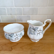 Load image into Gallery viewer, Royal Albert Silver Maple creamer and sugar set together, angled view showing gold-gilded feet and overall excellent vintage condition

