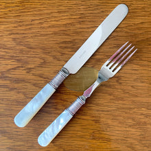 Load image into Gallery viewer, Antique EPNS silver plate fork and knife set featuring Mother-of-Pearl handles with locking royal blue velvet lined golden oak wood box, includes 3 keys. Crafted by Harrison Brothers &amp; Howson, England, circa 1890s. A gorgeous set of cutlery perfect for dessert and fruit service.

In excellent vintage condition, freshly polished. Phillips Montreal appraisal certificate included.

Fork measures 6 1/8 inches
Knife measures 7 1/2 inches
Box measures 11 1/4 x 9 1/4 inches
