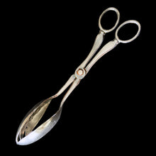 Load image into Gallery viewer, Beautifully detailed vintage silver plate salad tongs embossed with vegetables. Crafted by Sheffield, England, 1950s. Elegance personified!

In vintage condition. Maker's mark present.

Measures 1 3/4 x 2 1/4 x 8 3/8 inches
