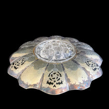 Load image into Gallery viewer, This lovely vintage silver plated flower vessel is ornately engraved with florals, decorative swirls, leaves and pierced details. Crafted by Essay Silversmiths, Canada 1950s. With the glass flower frog you&#39;ll be able to create a beautiful centrepiece.

Silver vessel is in vintage condition. Glass frog in excellent condition, no chips.

Vessel measures 6 3/8 x 2 1/4 inches (interior bowl diameter of 2 1/2 inches)

Glass frog measures 3 1/4 x 1 3/8 inches
