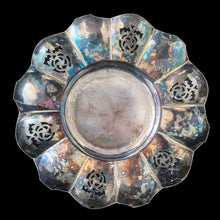 Load image into Gallery viewer, This lovely vintage silver plated flower vessel is ornately engraved with florals, decorative swirls, leaves and pierced details. Crafted by Essay Silversmiths, Canada 1950s. With the glass flower frog you&#39;ll be able to create a beautiful centrepiece.

Silver vessel is in vintage condition. Glass frog in excellent condition, no chips.

Vessel measures 6 3/8 x 2 1/4 inches (interior bowl diameter of 2 1/2 inches)

Glass frog measures 3 1/4 x 1 3/8 inches

