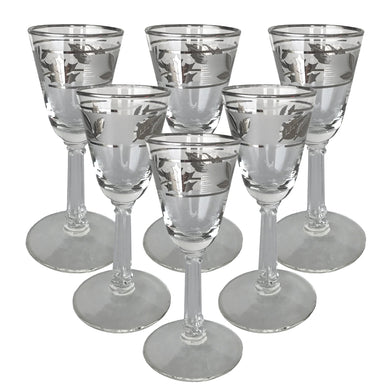 Set of six vintage Silver Foliage cordial glasses. Crafted by Libbey Glass, USA, 1953 - 1978. A fabulous addition to your barware collection!

In excellent condition, no chips or wear.

Measures 2 x 4 1/8 inches

Capacity 1 ounce
