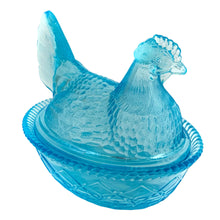 Load image into Gallery viewer, This highly collectible aqua blue pressed glass hen-on-nest is spectacular! Crafted by the Westmoreland Glass Company, USA. Use it as a trinket, soap, catchall, candy or nut dish...or whatever you wish. Makes a fantastic easter decor piece and suits any style....shabby chic, cottage, farmhouse, industrial and we dare say, modern! In excellent condition, no chips or cracks. Marked with embossed WG 1949-1984. Measures 7 1/2 x 5 7/8 x 6 1/4 inches
