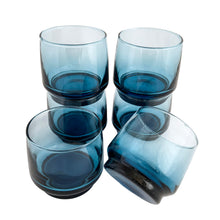 Load image into Gallery viewer, Adorn your table with this timeless set of 8 smokey blue rocks glass tumblers. Crafted by Dominion Glass, Canada, in the 1970s. These elegant glasses will add a vintage touch to any gathering. Enjoy a classic toast with a stunningly beautiful drinkware set!  In excellent condition, free from chips.  Measures 3 x 2 3/4 inches  Capacity 6 ounces

