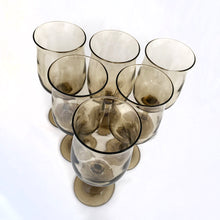 Load image into Gallery viewer, Set of six vintage smokey brown Connoisseur wine glasses. Crafted by Libbey Glass, USA, 1980s. These elegantly shaped vessels are sure to add elegance to any tablescape and display beautifully on a bar cart. Cheers!

Measures 2 7/8 x 7 1/4 inches

Capacity 12 ounces
