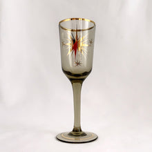 Load image into Gallery viewer, Gorgeous set of six vintage mid-century modern smokey brown liquor glasses decorated with atomic gold stars and rims.  In excellent condition, free from chips/wear.  Measures 1 3/4 x 5 1/8 inchesGorgeous set of six vintage mid-century modern smokey brown liquor glasses decorated with atomic gold stars and rims.  In excellent condition, free from chips/wear.  Measures 1 3/4 x 5 1/8 inches
