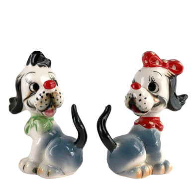 Vintage hand painted Snirky and Sally circus dog salt and pepper shakers. Artmark, Japan, 1950s. Add these adorable kitschy shakers to your collection!

In excellent condition, no chips/cracks/repairs. Unmarked.

Measures 3 x 1 7/8 x 4 1/8 inches