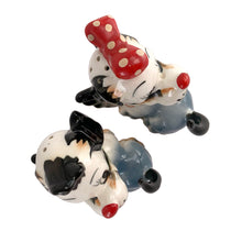 Load image into Gallery viewer, Vintage hand painted Snirky and Sally circus dog salt and pepper shakers. Artmark, Japan, 1950s. Add these adorable kitschy shakers to your collection!

In excellent condition, no chips/cracks/repairs. Unmarked.

Measures 3 x 1 7/8 x 4 1/8 inches
