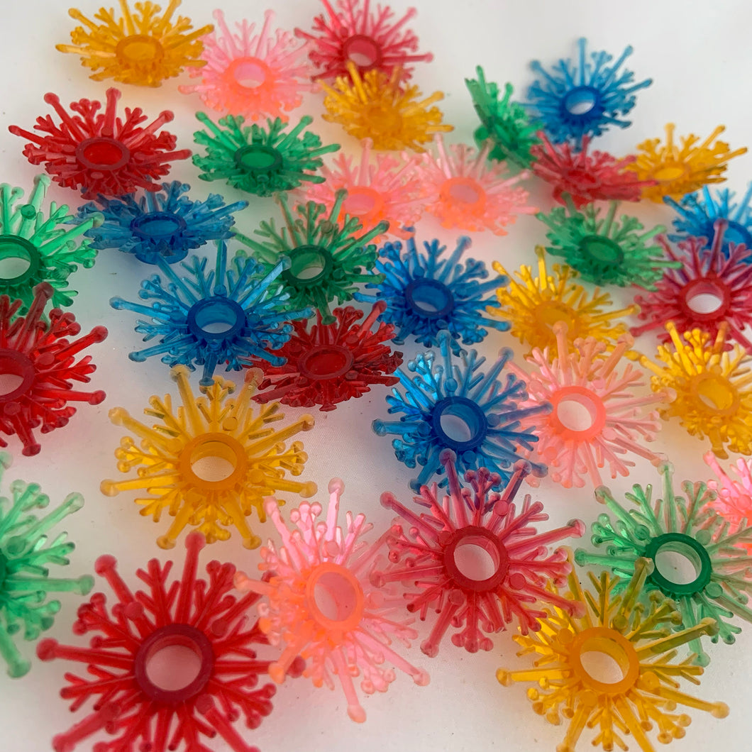 Lot of 34 vintage colourful plastic snowflake Christmas tree light reflector accessories, in blue, yellow, red, pink, green.

In vintage condition with minor breaks on a few pieces.

Outer dimension measures 1 3/4 inches, hole measures 3/8 inch

Jacks Daughter of All Trades Vintage Antique Retro Christmas Tree Lights ornament decoration snowflake reflector Home Decor Collectible Toronto

