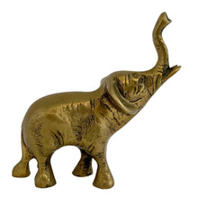 Load image into Gallery viewer, Right-side profile view of vintage solid brass elephant figurine, trunk raised for luck, aged golden patina, 1970s Korea
