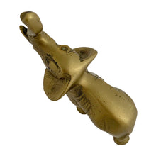 Load image into Gallery viewer, Overhead view of vintage solid brass elephant figurine showing trunk-up detail and aged brass texture, 1970s Korea
