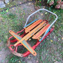 Load image into Gallery viewer, Classic vintage mid-century Spartan child&#39;s pull snow sleigh or sled. This one features a steel frame with red metal skis, wood slat deck and steering bar, metal backrest and long wood handle with red metal hand grip. Crafted by Werlich Industries, Canada, 1960s. Bring back all the wonderful of snowy winter days with this beloved wee sled!

In as found vintage condition with wear to the entire piece commensurate with use and age. Original sticker present.
