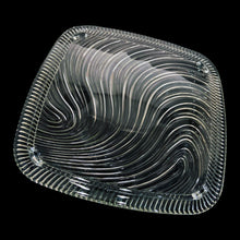 Load image into Gallery viewer, Fabulous vintage mid-century square cake keeper with clear pressed glass footed cake stand featuring a wavy pattern and chrome dome lid with Bakelite handle labeled CAKE in white letters. Crafted by Kromex, Circa 1950s. The perfect way to safely store and keep your pretty cakes fresh and ready to serve!

In excellent condition, minimal wear, no chips to the glass plate.

Cake stand measures 12 5/8 x 1 1/4 inches

Chrome dome measures 11 3/4 x 11 3/4 x 6 inches
