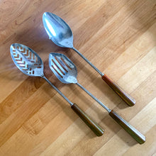 Load image into Gallery viewer, Full set of three vintage Skyline stainless steel spoons with marbled amber, green, and yellow Bakelite handles, laid flat on a light surface
