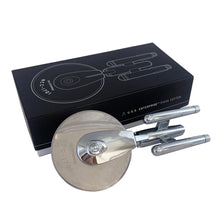 Load image into Gallery viewer, New in box Star Trek USS Enterprise NCC-1701 pizza cutter modeled after the original series. Made of all metal construction with a stainless steel blade. Officially licensed Star Trek collectible, designed by Think Geek™ 2010. Boldly cut pizza where no man has cut before!

In excellent used condition, in original box.

