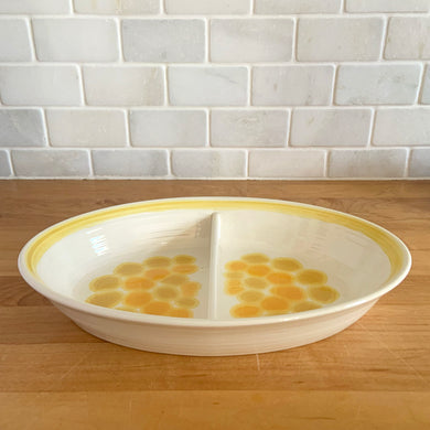 Vintage Sundance ceramic oval divided vegetable dish features a sunny yellow graphic design. Crafted by Franciscan, England, 1972 - 1977. A lovely way to add sunshine to your tableware!  In vintage condition, free from chips.