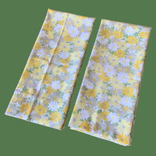Load image into Gallery viewer, Pair of vintage Superlin yellow Daisy Fair floral pillowcases. 50% cotton 50% polyester. Crafted by Wamsutta, USA, 1971. Add vintage charm to your bedroom with these beauties!

In excellent vintage condition, no stains or tears.

Measures 32 1/2 x 20 1/4 inches
