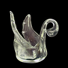 Load image into Gallery viewer, Experience the timeless beauty of this vintage hand blown clear art glass swan bomboniere. Crafted by Chalet Glass, Canada, circa 1970s.  Transform any space with its versatile use as a decoration or as a votive or tealight holder for a warm and inviting atmosphere.  In excellent condition, free from chips.  Measures 4 1/2 x 2 3/4 x 4 inches   
