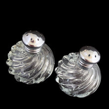 Load image into Gallery viewer, Enhance your tablescape with these vintage round swirl glass salt and peppers shakers topped with steel lids....so charming! In excellent condition, free from chips. Marked &quot;Irice NY&quot;. Made in Japan Measures 1 1/2 x 2 inches
