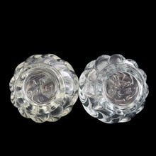 Load image into Gallery viewer, Enhance your tablescape with these vintage round swirl glass salt and peppers shakers topped with steel lids....so charming! In excellent condition, free from chips. Marked &quot;Irice NY&quot;. Made in Japan Measures 1 1/2 x 2 inches
