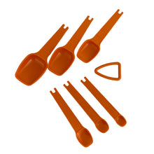 Load image into Gallery viewer, Vintage orange measuring spoon set. Crafted by Tupperware, 1970s.
There are seven spoons ranging from 1/8 teaspoon up to 1 tablespoon and each attaches to a ring to keep them organized. The perfect gift for any Tupperware collector, baker or cook.

In good used condition.

Part numbers range from 1268-4 to 1272-4
